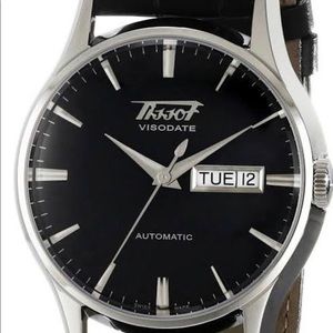 Men’s Tissot real leather watch.